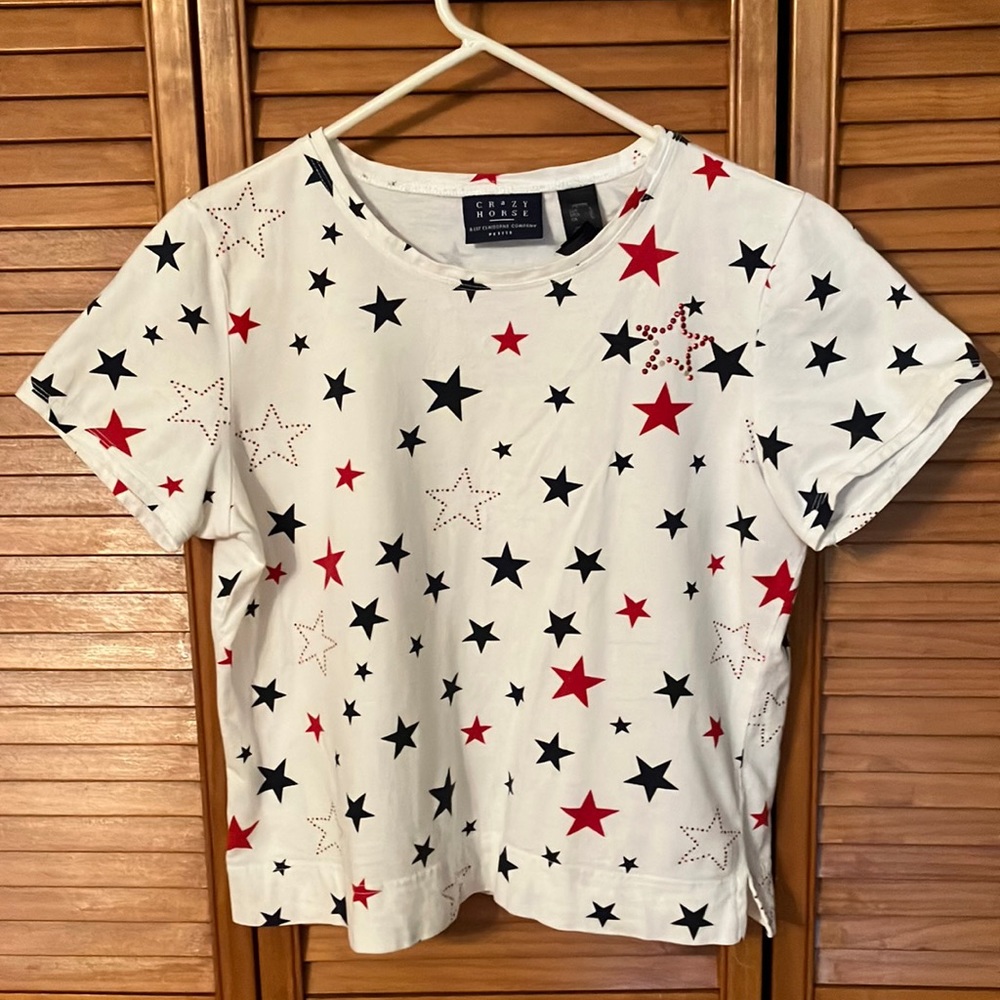 Fourth of July crop top; White with red, white and blue stars. 100% cotton.